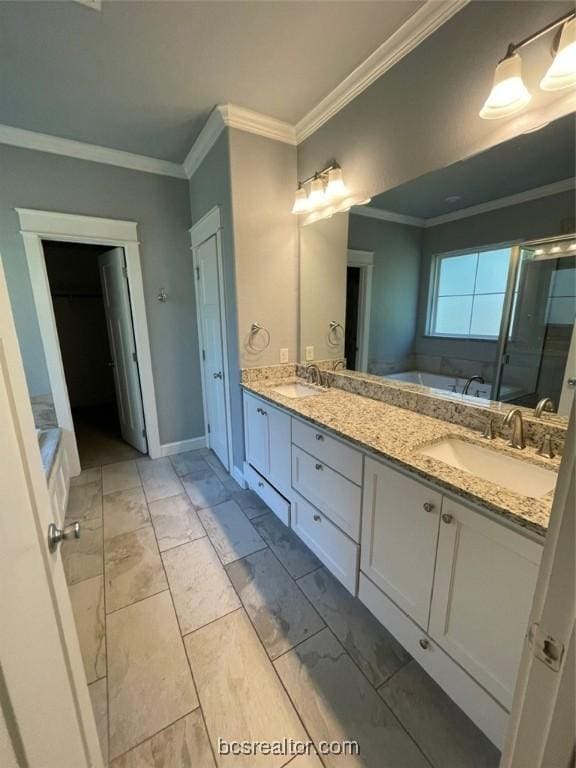 bathroom featuring separate shower and tub, vanity, and ornamental molding