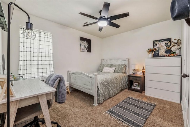 bedroom featuring ceiling fan and carpet floors