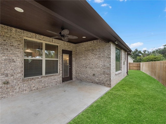 view of patio featuring ceiling fan