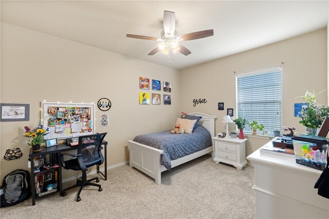 3312 Wakewell Ct, College Station, TX 77845 - bedroom featuring light carpet, a ceiling fan, and baseboards
