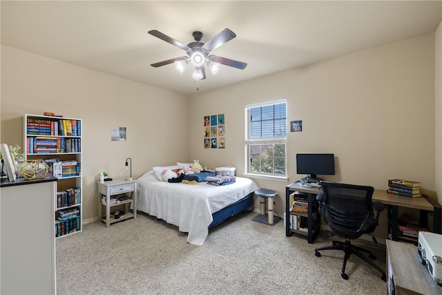 carpeted bedroom featuring a ceiling fan