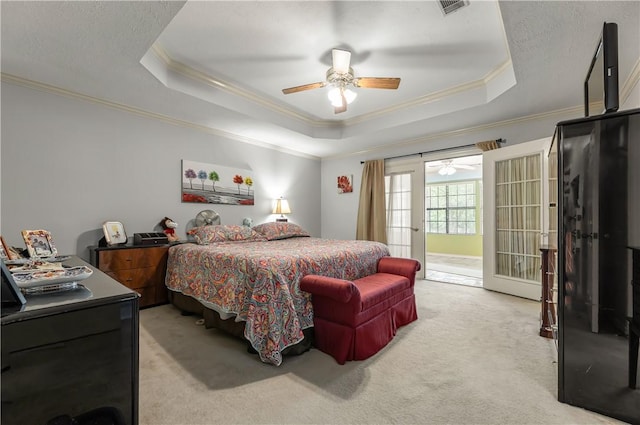 3003 Aztec St, College Station, TX 77845 - carpeted bedroom featuring ornamental molding, a raised ceiling, and ceiling fan