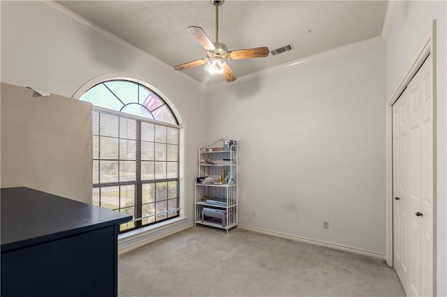 3003 Aztec St, College Station, TX 77845 - unfurnished office with crown molding, healthy amount of natural light, a ceiling fan, light colored carpet, and baseboards
