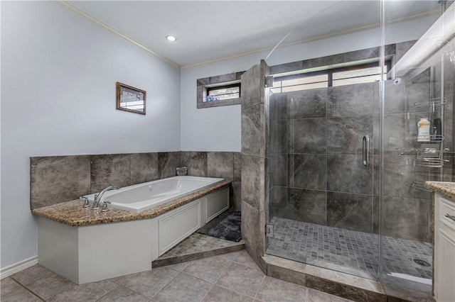 3003 Aztec St, College Station, TX 77845 - bathroom featuring crown molding, a garden tub, a shower stall, tile patterned floors, and vanity