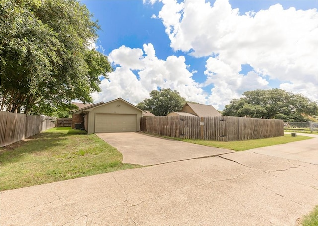 2306 Windsor Dr, Bryan, TX 77802 - view of front of home with concrete driveway and a garage
