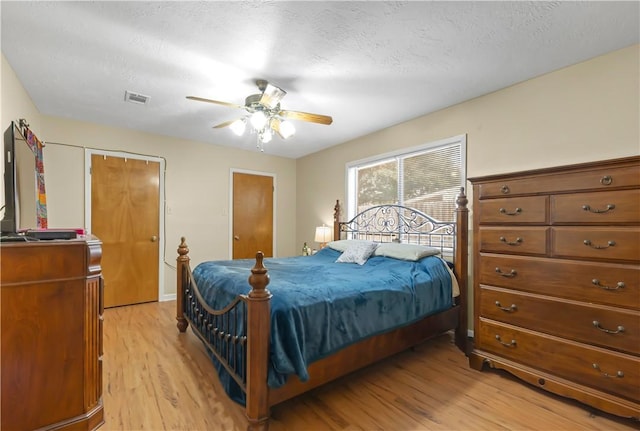 2306 Windsor Dr, Bryan, TX 77802 - bedroom featuring light wood-style flooring and ceiling fan