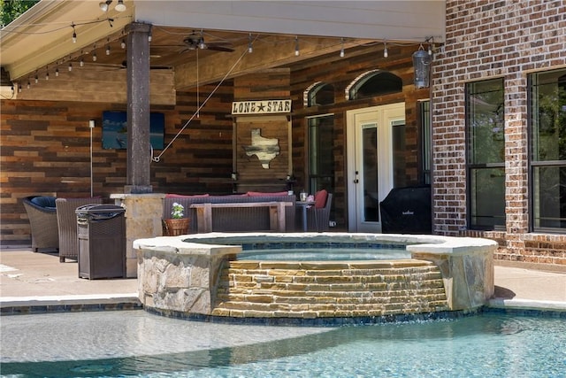 5249 Drake Dr, College Station, TX 77845 - view of patio / terrace with a pool with connected hot tub