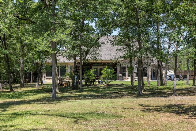 5249 Drake Dr, College Station, TX 77845 - view of home's community with a yard