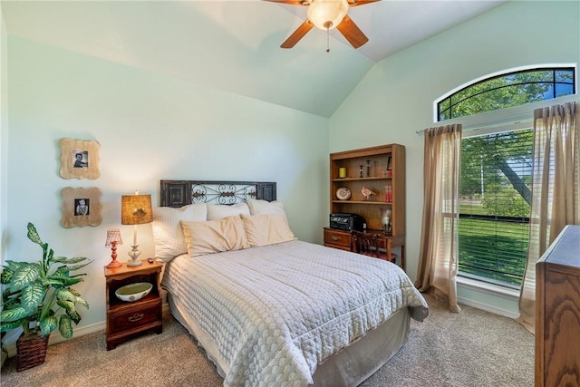 5249 Drake Dr, College Station, TX 77845 - carpeted bedroom with lofted ceiling, a ceiling fan, and baseboards