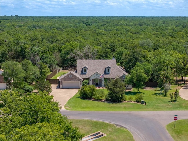 5249 Drake Dr, College Station, TX 77845 - view from above of property with a forest