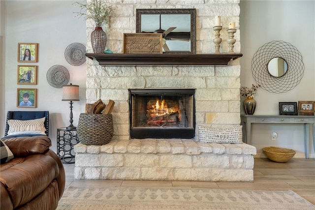 5249 Drake Dr, College Station, TX 77845 - sitting room with a fireplace, wood finished floors, and baseboards