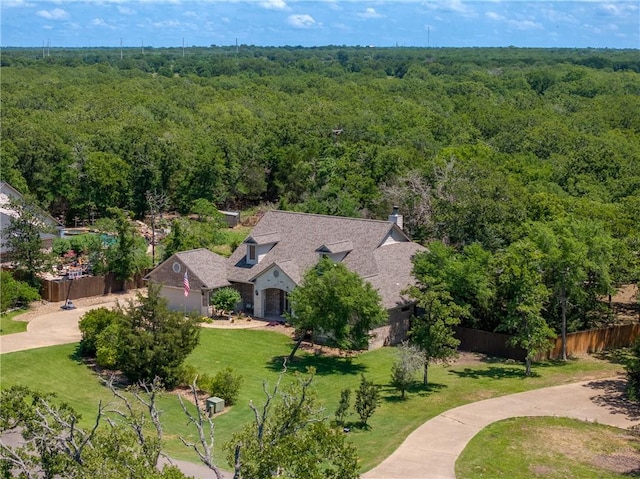5249 Drake Dr, College Station, TX 77845 - aerial view of property and surrounding area featuring a heavily wooded area