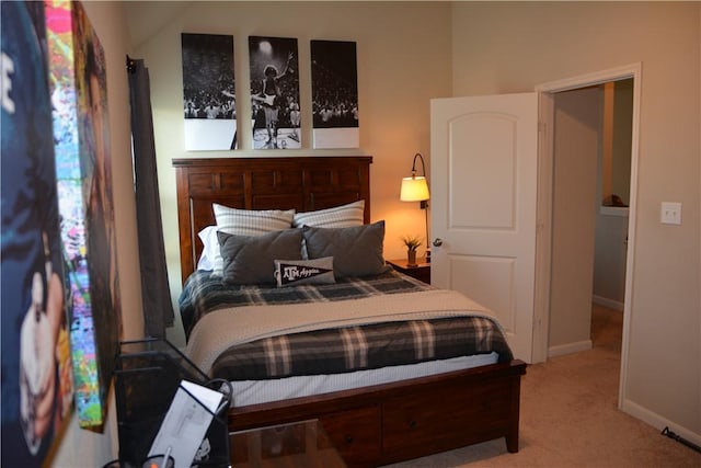 carpeted bedroom with baseboards