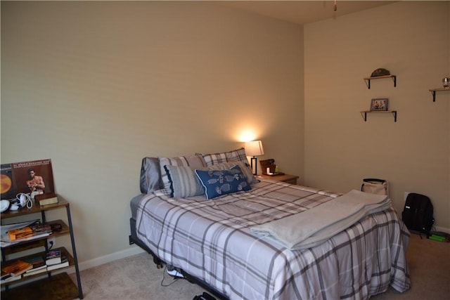 carpeted bedroom with baseboards