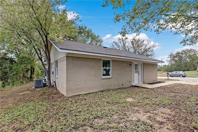 exterior space featuring central AC unit