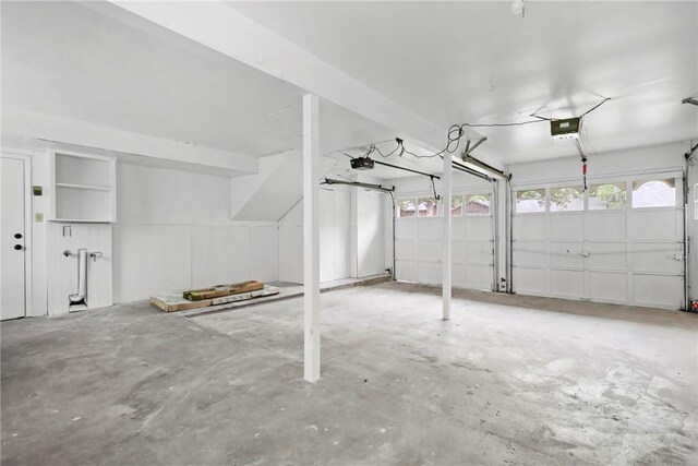 1436 Magnolia Dr, College Station, TX 77840 - garage featuring a garage door opener