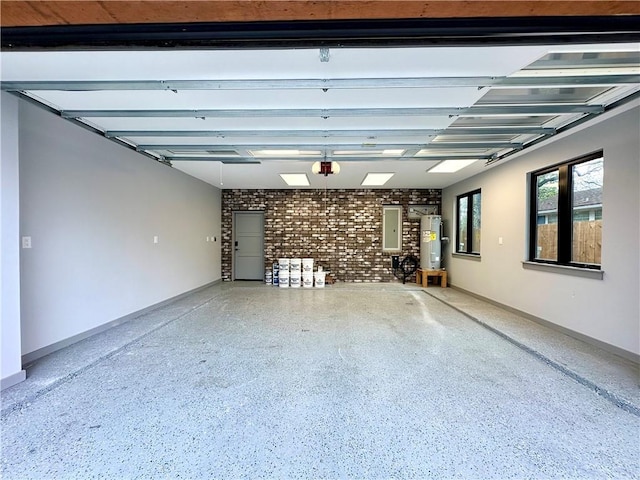 garage with electric water heater and baseboards