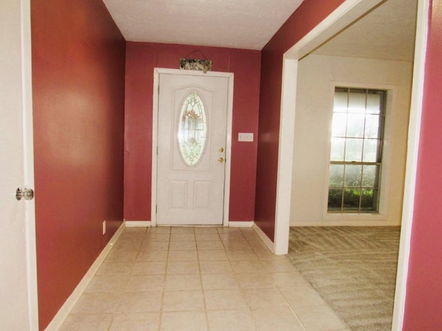 entrance foyer featuring baseboards