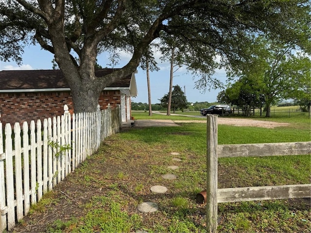 view of yard with fence