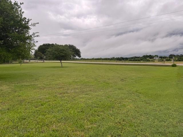 view of community with a yard