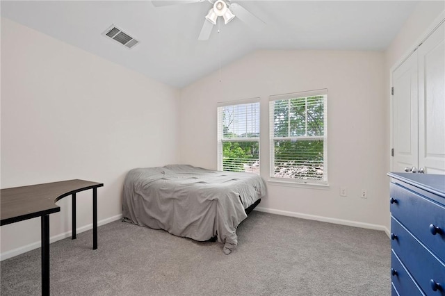 1725 Harvey Mitchell Pkwy, College Station, TX 77840 - bedroom with vaulted ceiling, carpet, baseboards, and ceiling fan