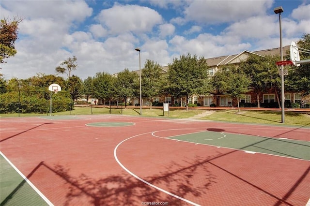 1725 Harvey Mitchell Pkwy, College Station, TX 77840 - view of basketball court featuring community basketball court and a lawn