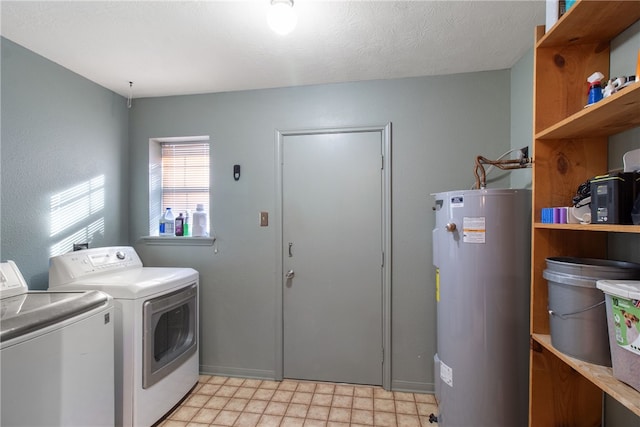 9777 Deer Trail Run, Hearne, TX 77859 - washroom featuring water heater and separate washer and dryer