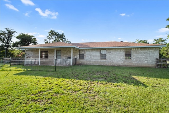 9777 Deer Trail Run, Hearne, TX 77859 - rear view of house with brick siding