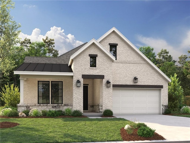 view of front facade with a front yard and a garage