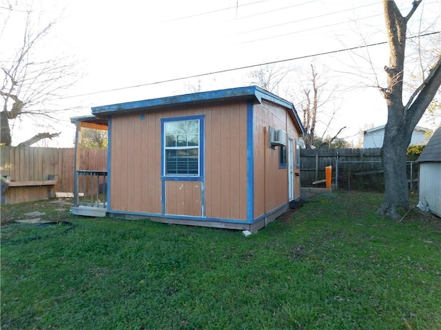 view of outdoor structure with a lawn