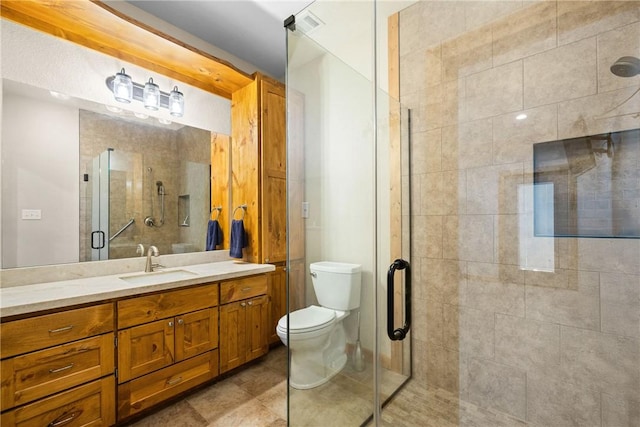 3205 County Road 308, Caldwell, TX 77836 - bathroom with a shower stall, vanity, and toilet