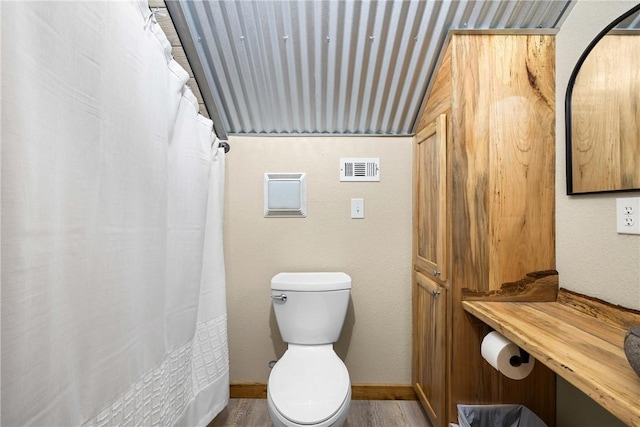 3205 County Road 308, Caldwell, TX 77836 - bathroom featuring toilet and wood finished floors