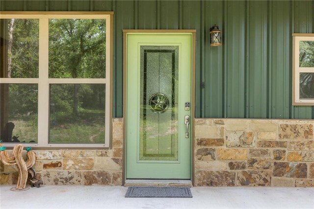 3205 County Road 308, Caldwell, TX 77836 - entrance to property with board and batten siding and stone siding