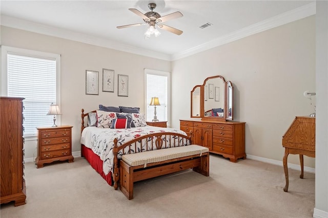 bedroom featuring baseboards, ornamental molding, light carpet, and visible vents