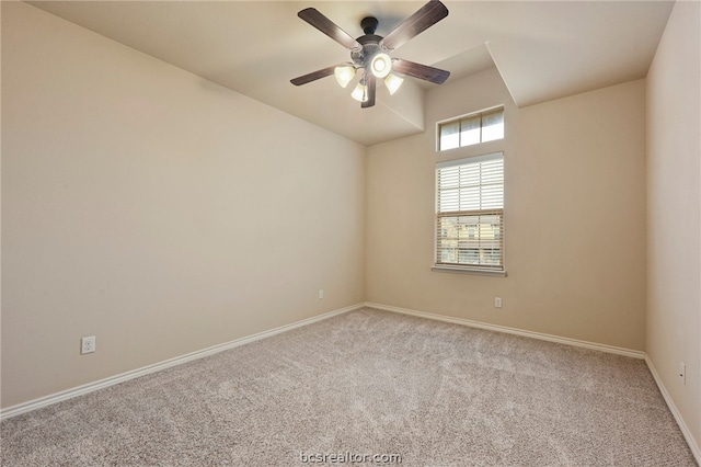 128 Kimber Ln, College Station, TX 77845 - carpeted empty room featuring a ceiling fan, vaulted ceiling, and baseboards