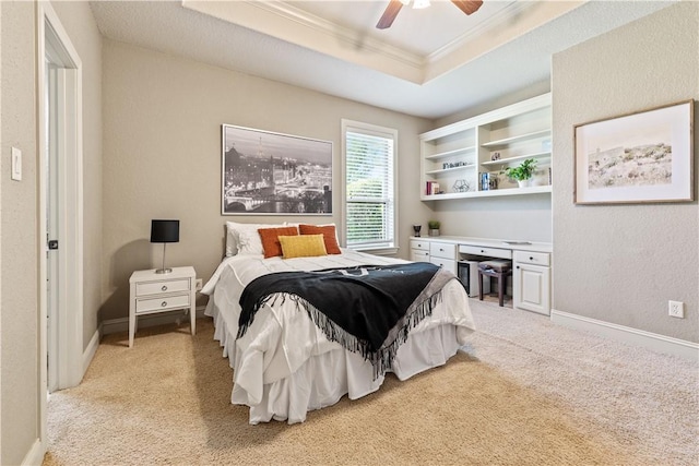 18265 Windmill Ct, College Station, TX 77845 - bedroom featuring a raised ceiling, light carpet, ornamental molding, and ceiling fan