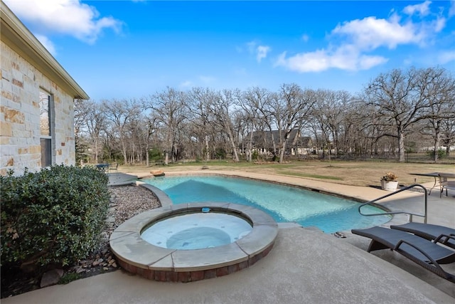 view of pool featuring a patio, a yard, and a pool with connected hot tub