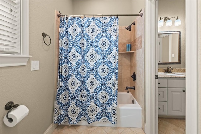 full bathroom with shower / bath combo with shower curtain, vanity, and tile patterned flooring