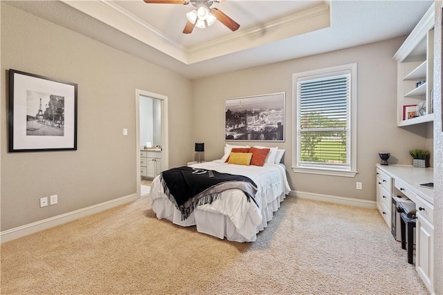 18265 Windmill Ct, College Station, TX 77845 - bedroom with a tray ceiling, crown molding, light colored carpet, ensuite bathroom, and a ceiling fan