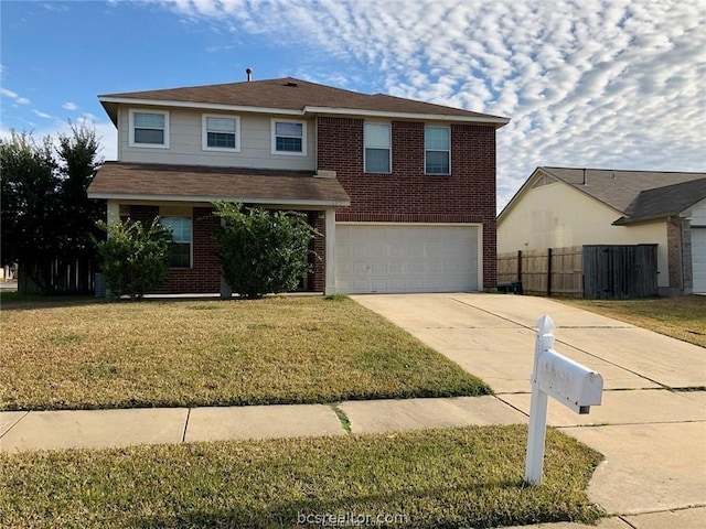 view of front property with a garage and a front lawn