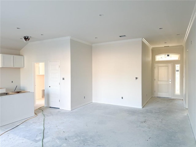 unfurnished living room featuring baseboards, crown molding, visible vents, and unfinished concrete floors