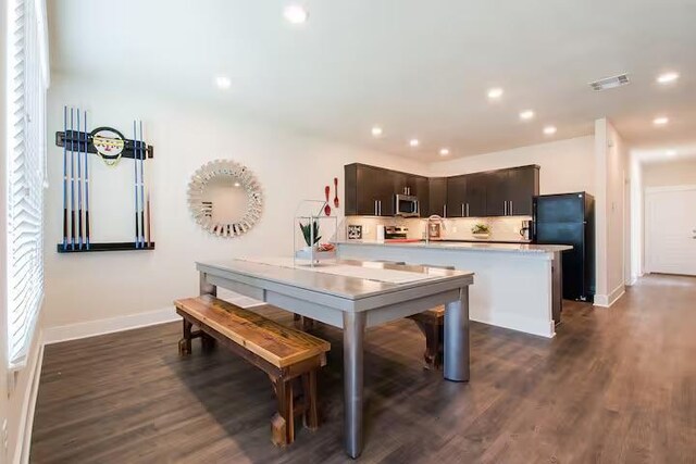 442 William D Fitch Pkwy, College Station, TX 77845 - dining area with recessed lighting, baseboards, and dark wood finished floors