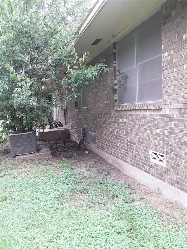 view of property exterior featuring central AC unit