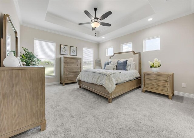 3310 Hunters Crossing Trl, Bryan, TX 77808 - bedroom featuring a raised ceiling, light colored carpet, baseboards, recessed lighting, and ornamental molding