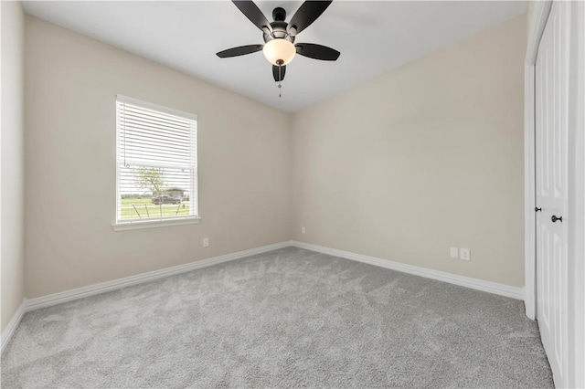 3310 Hunters Crossing Trl, Bryan, TX 77808 - carpeted spare room featuring baseboards and ceiling fan