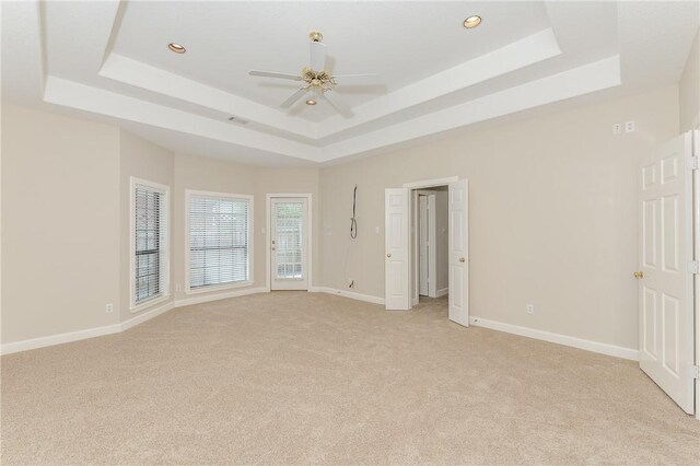 9300 Lakeside Ct, College Station, TX 77845 - empty room featuring a raised ceiling, light carpet, and recessed lighting