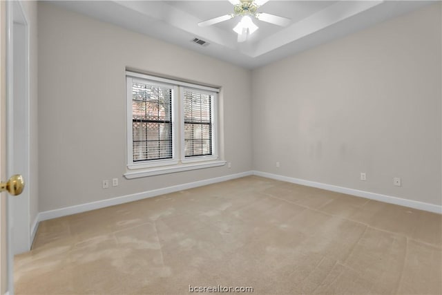 carpeted empty room with ceiling fan