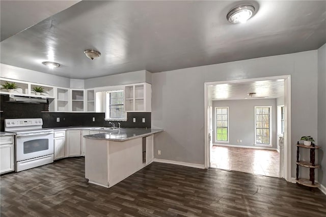 kitchen with range hood, open shelves, electric range, a peninsula, and dark wood-style flooring