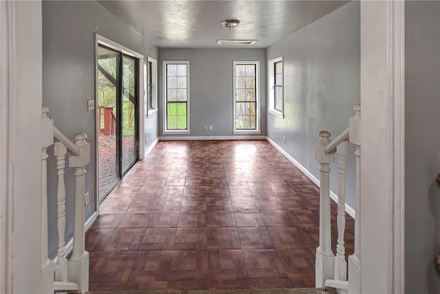 entrance foyer featuring baseboards