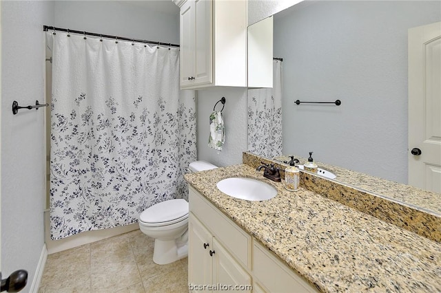 bathroom with tile patterned floors, walk in shower, vanity, and toilet